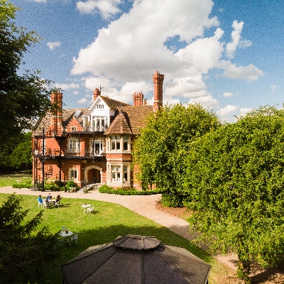 Berwick Lodge is an imposing red-brick Victorian manor house