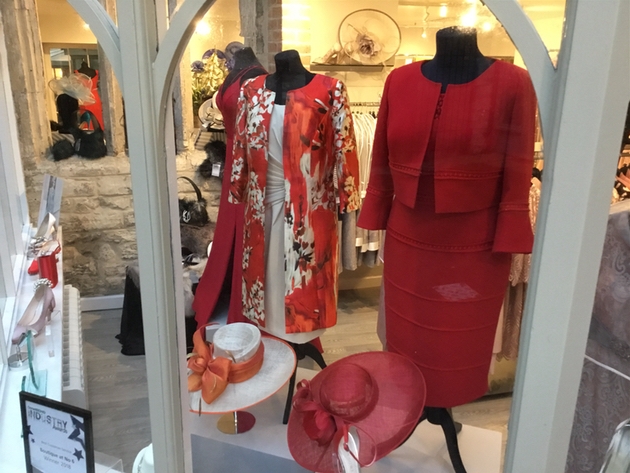 red mother of the bride outfits in shop window