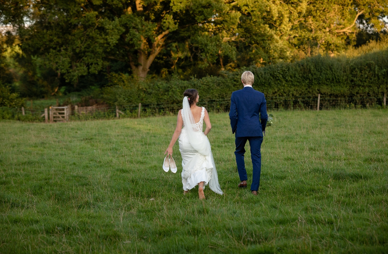 Bride walks barefoot