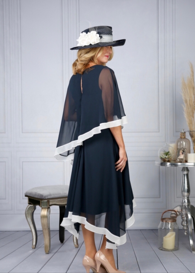 New range of mother of the bride attire and bellissimo occasion wear. Navy outfit with white trim