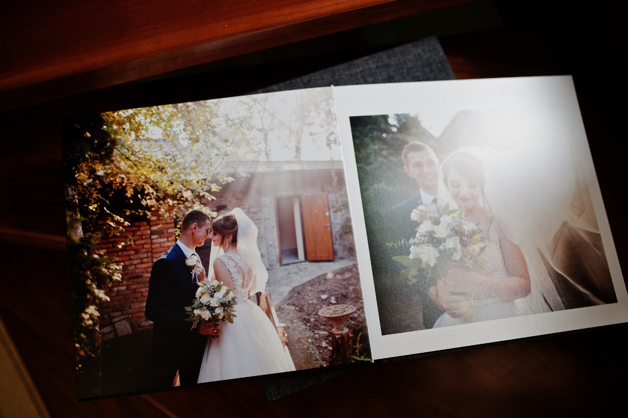 a wedding album laid out with two large images on