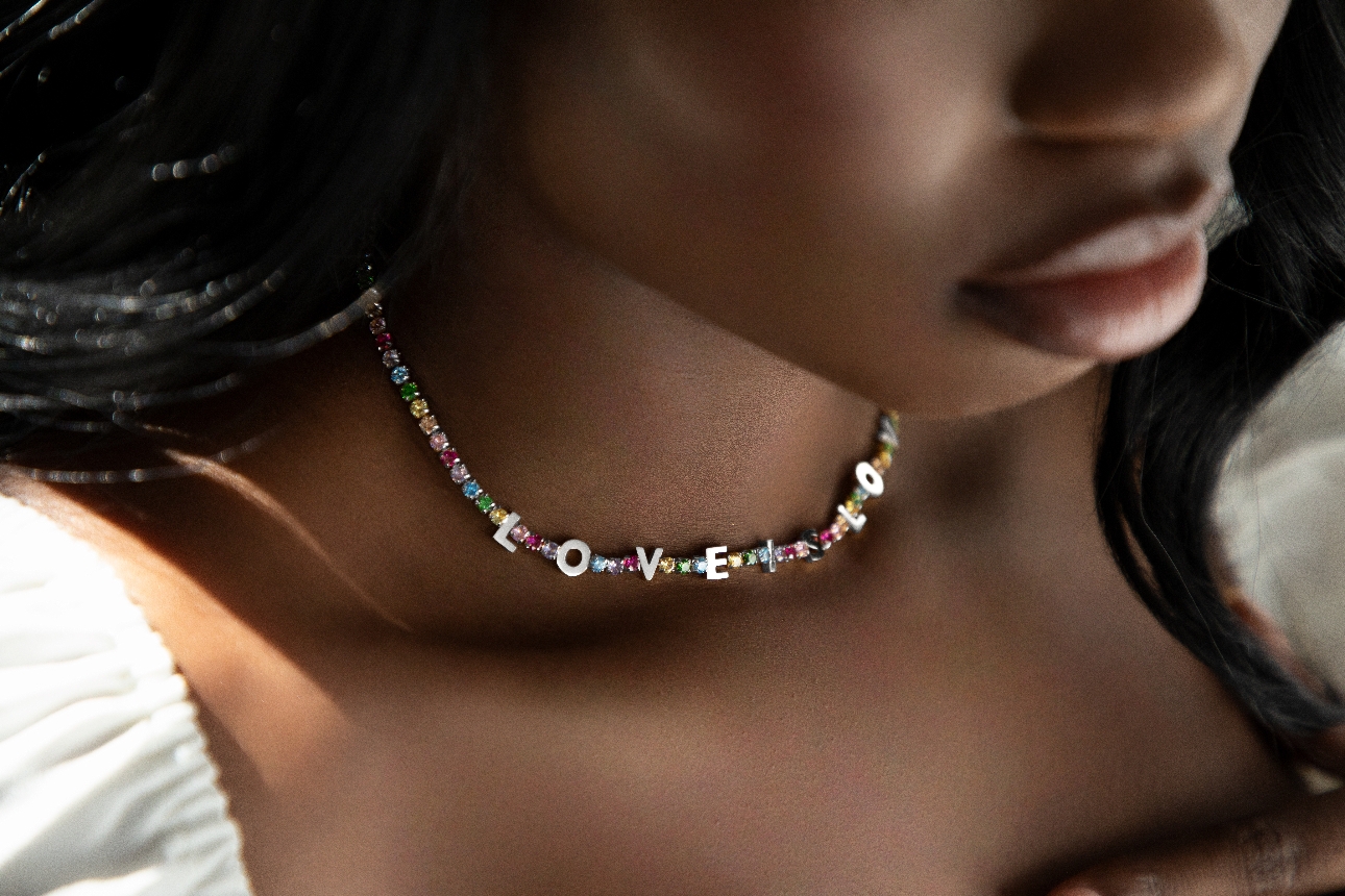 multicoloured diamante necklace with silver letters of LOVE