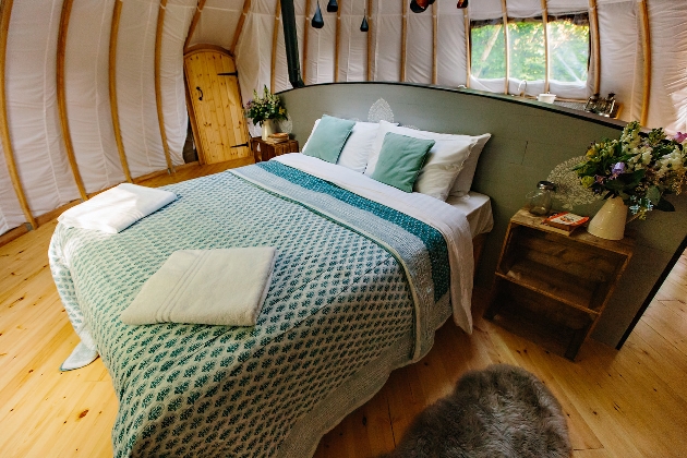large bed in a yurt