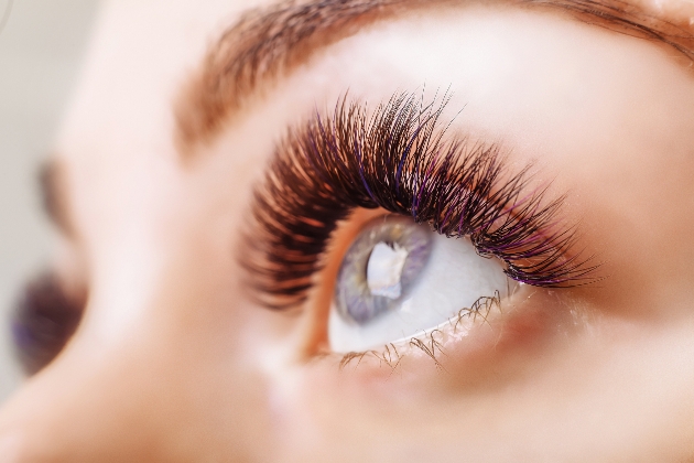 Close up of a woman's eye wearing false lashes