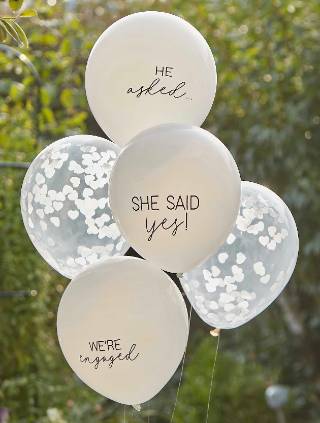 white and clear engaged balloons