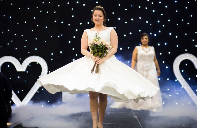 bride on catwalk at south west wedding show