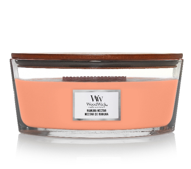 WoodWick® short oval candle with a blush colour wax